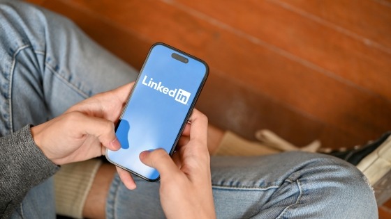 User opening LinkedIn App on mobile device
